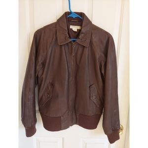 JCrew bomber jacket. Genuine leather. Knit details 100 percent wool. Size M